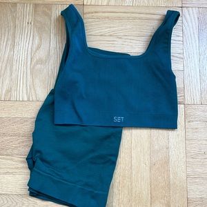 Set Active women’s green sports bra + biker shorts